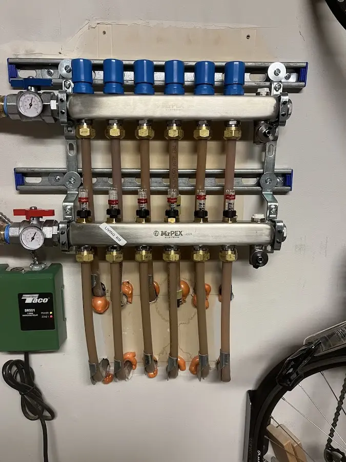 Plumber performing Water Heater Repair at a residential property in Titusville